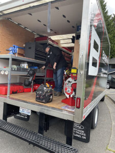 technician-in-back-of-truck