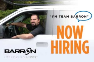 technician-in-barron-van-and-text-that-says-i'm-team-Barron-now-hiring